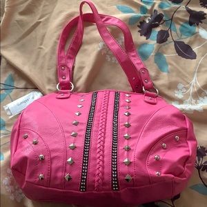 Pink studded shoulder bag
